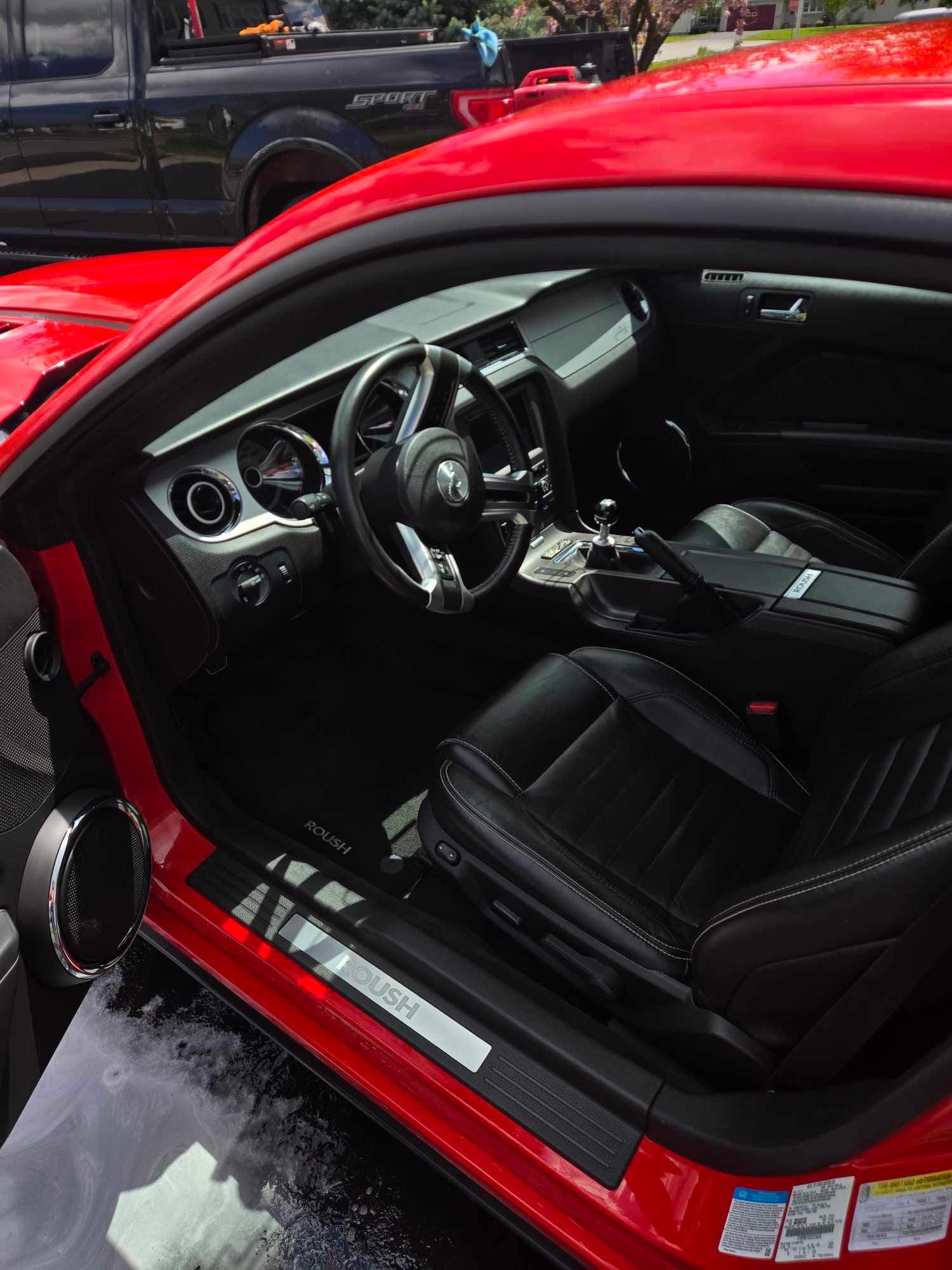 Mustang door jamb and interior cleaned to a Roush-quality finish